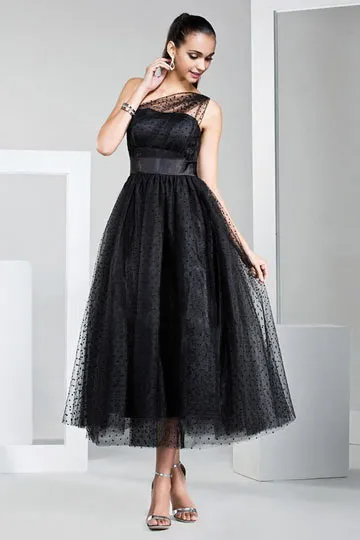 Robe  asymétrique bustier cœur noire mi longue à pois en tulle